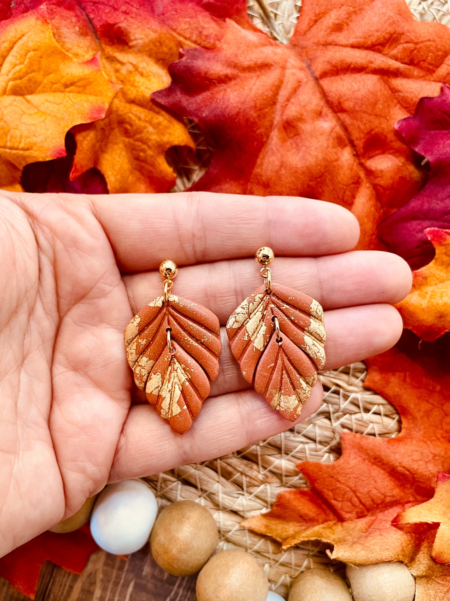 Gold Feather Clay Dangle Earrings